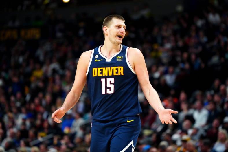 Jan 17, 2023; Denver, Colorado, USA; Denver Nuggets center Nikola Jokic (15) reacts in the second half against the Portland Trail Blazers at Ball Arena. Mandatory Credit: Ron Chenoy-USA TODAY Sports