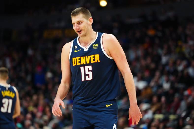 Jan 17, 2023; Denver, Colorado, USA; Denver Nuggets center Nikola Jokic (15) reacts in the second half against the Portland Trail Blazers at Ball Arena. Mandatory Credit: Ron Chenoy-USA TODAY Sports