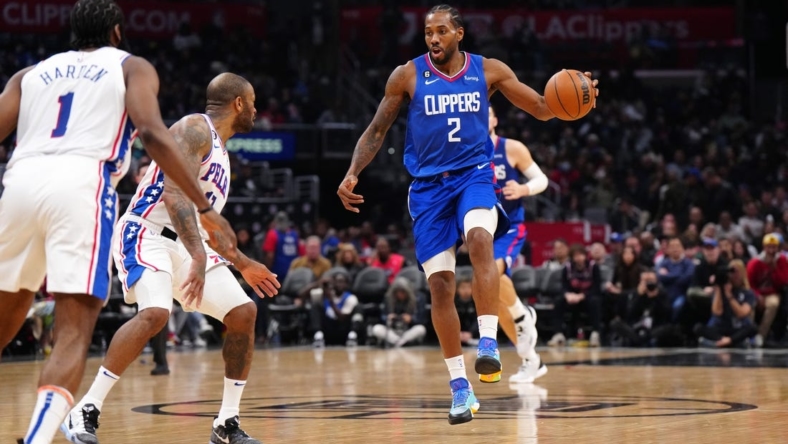 Jan 17, 2023; Los Angeles, California, USA; LA Clippers forward Kawhi Leonard (2) dribbles the ball against the Philadelphia 76ers in the second half at Crypto.com Arena. Mandatory Credit: Kirby Lee-USA TODAY Sports