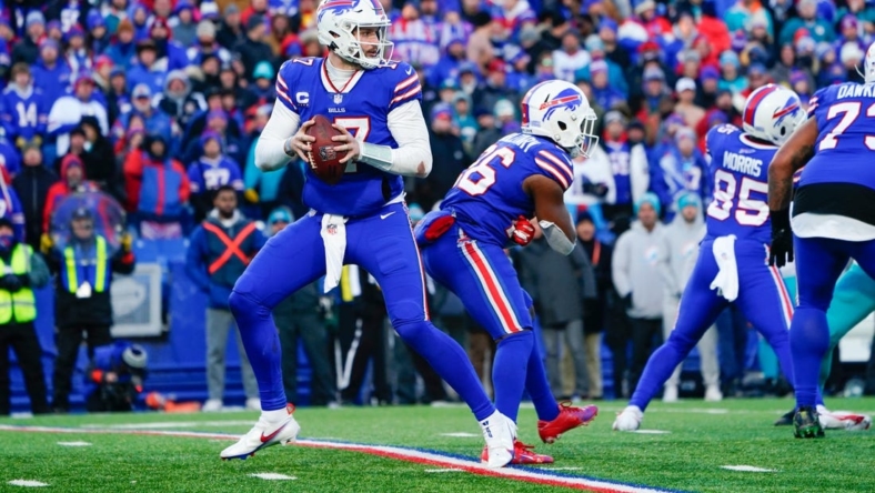 Jan 15, 2023; Orchard Park, New York, USA; Buffalo Bills quarterback Josh Allen (17) against the Miami Dolphins during a wild card game at Highmark Stadium. Mandatory Credit: Gregory Fisher-USA TODAY Sports