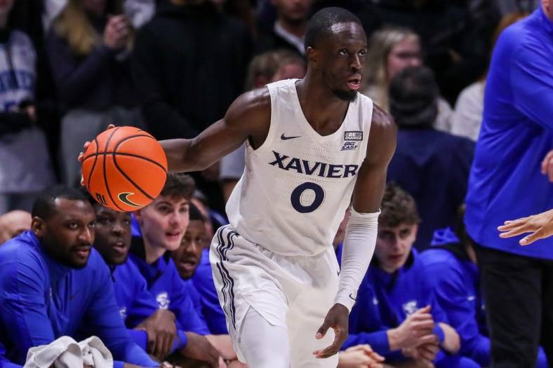 Jan 11, 2023; Cincinnati, Ohio, USA; Xavier Musketeers guard Souley Boum (0) dribbles against the Creighton Bluejays in the first half at Cintas Center. Mandatory Credit: Katie Stratman-USA TODAY Sports