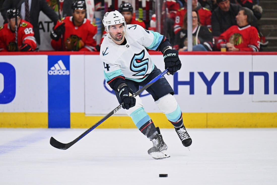 Jan 14, 2023; Chicago, Illinois, USA;  Seattle Kraken defenseman Justin Schultz (4) skates against the Chicago Blackhawks at United Center. Seattle defeated Chicago 8-5. Mandatory Credit: Jamie Sabau-USA TODAY Sports