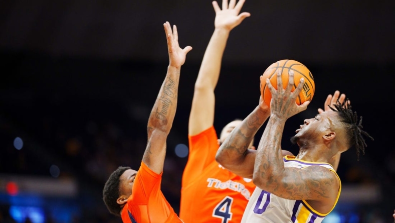Jan 18, 2023; Baton Rouge, Louisiana, USA; LSU Tigers guard Trae Hannibal (0) shoots the ball against against the Auburn Tigers during the first half at Pete Maravich Assembly Center. Mandatory Credit: Andrew Wevers-USA TODAY Sports
