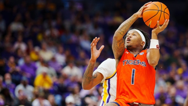 Jan 18, 2023; Baton Rouge, Louisiana, USA; Auburn Tigers guard Wendell Green Jr. (1) shoots the ball against the LSU Tigers during the second half at Pete Maravich Assembly Center. Mandatory Credit: Andrew Wevers-USA TODAY Sports