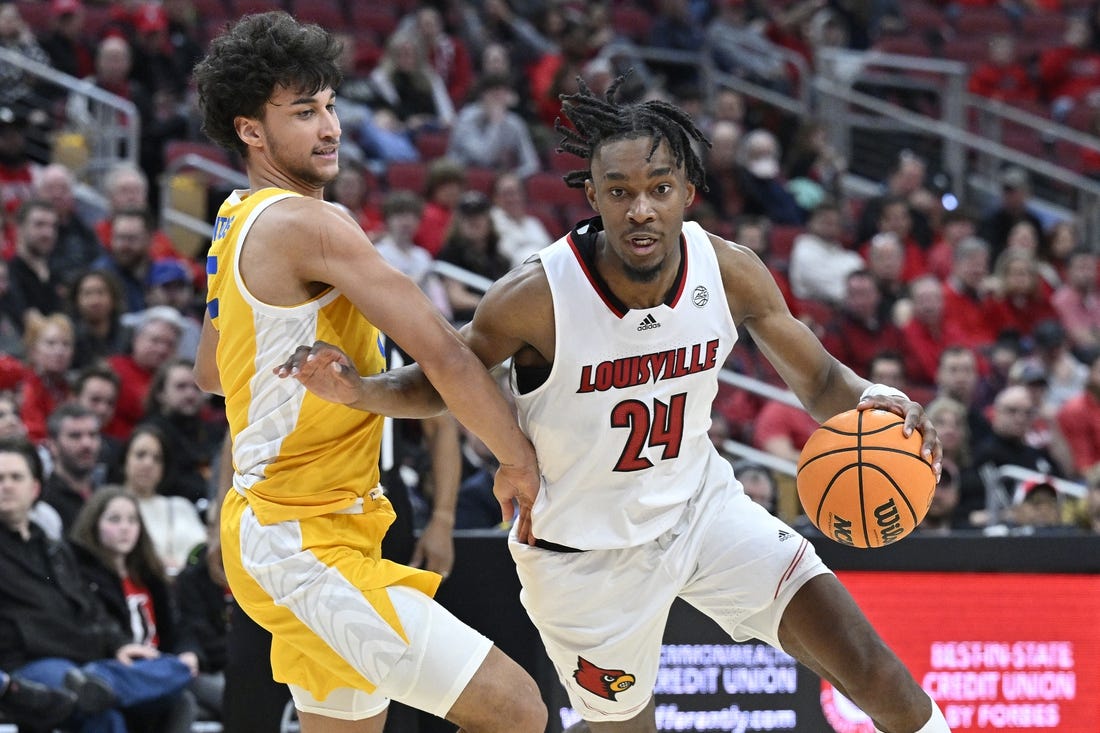 Jan 18, 2023; Louisville, Kentucky, USA;  Louisville Cardinals forward Jae'Lyn Withers (24) dribbles against Pittsburgh Panthers forward Nate Santos (5) during the second half at KFC Yum! Center. Pittsburg defeated Louisville 75-54. Mandatory Credit: Jamie Rhodes-USA TODAY Sports