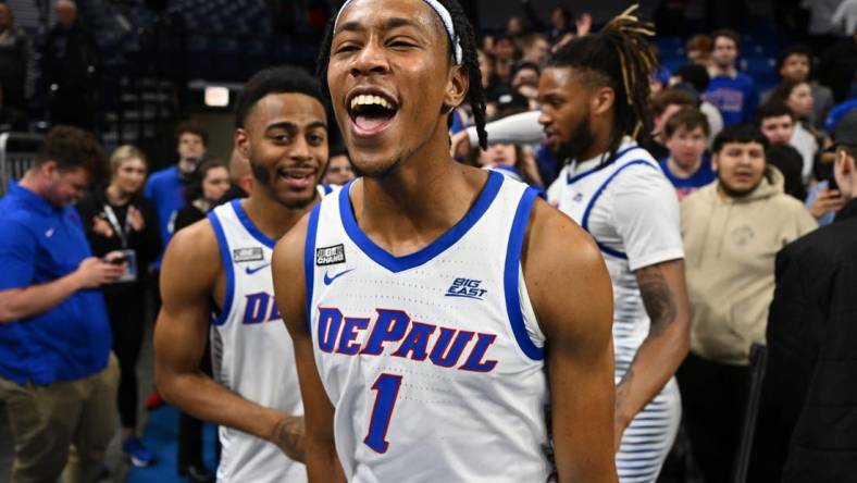 Jan 18, 2023; Chicago, Illinois, USA; DePaul Blue Demons forward Javan Johnson (1) celebrates after upsetting the Xavier Musketeers 73-72at Wintrust Arena. Mandatory Credit: Jamie Sabau-USA TODAY Sports