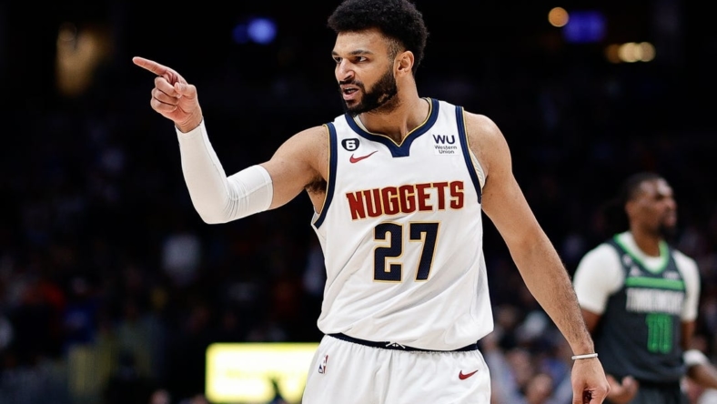 Jan 18, 2023; Denver, Colorado, USA; Denver Nuggets guard Jamal Murray (27) gestures to the bench after a play against the Minnesota Timberwolves in the fourth quarter at Ball Arena. Mandatory Credit: Isaiah J. Downing-USA TODAY Sports