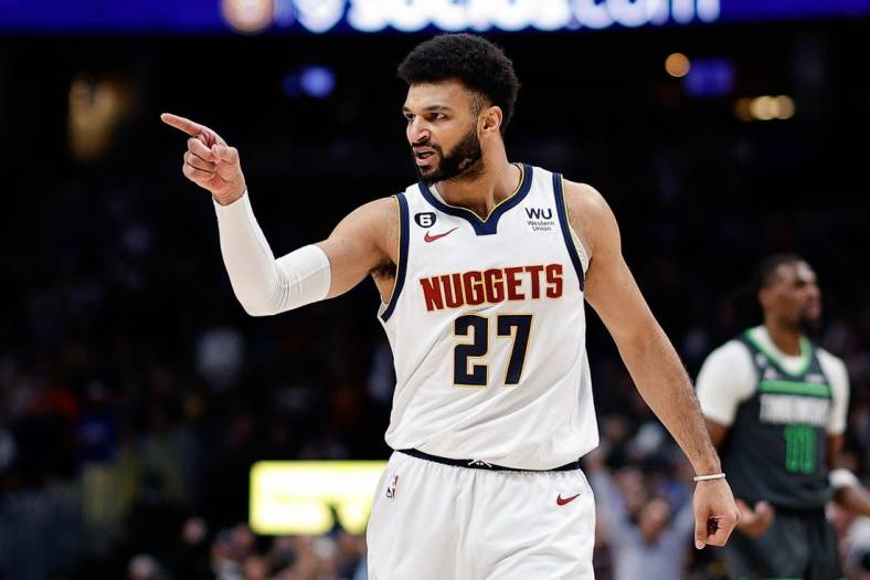 Jan 18, 2023; Denver, Colorado, USA; Denver Nuggets guard Jamal Murray (27) gestures to the bench after a play against the Minnesota Timberwolves in the fourth quarter at Ball Arena. Mandatory Credit: Isaiah J. Downing-USA TODAY Sports