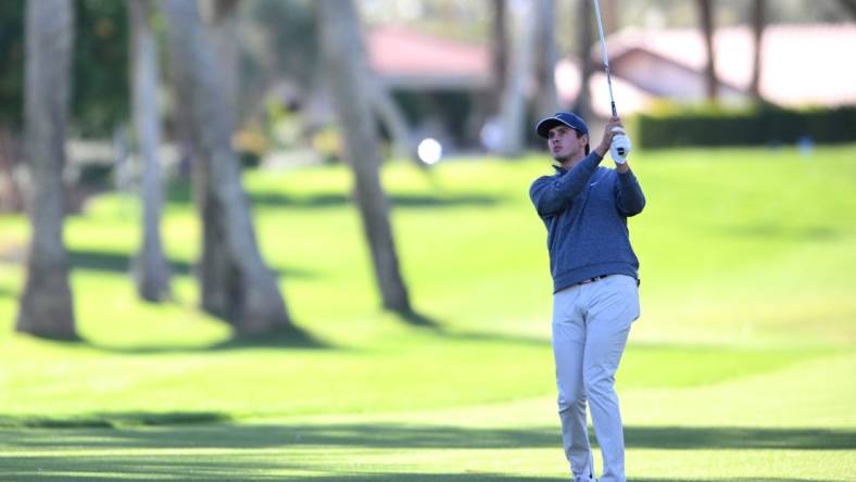 Jan 19, 2023; La Quinta, California, USA; Davis Thompson plays his second shot on the fourth hole during the first round of The American Express golf tournament at La Quinta Country Club. Mandatory Credit: Orlando Ramirez-USA TODAY Sports