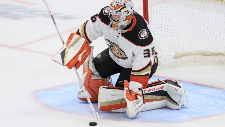Jan 19, 2023; Columbus, Ohio, USA;  Anaheim Ducks goaltender John Gibson (36) controls the puck against the Columbus Blue Jackets in the third period at Nationwide Arena. Mandatory Credit: Aaron Doster-USA TODAY Sports