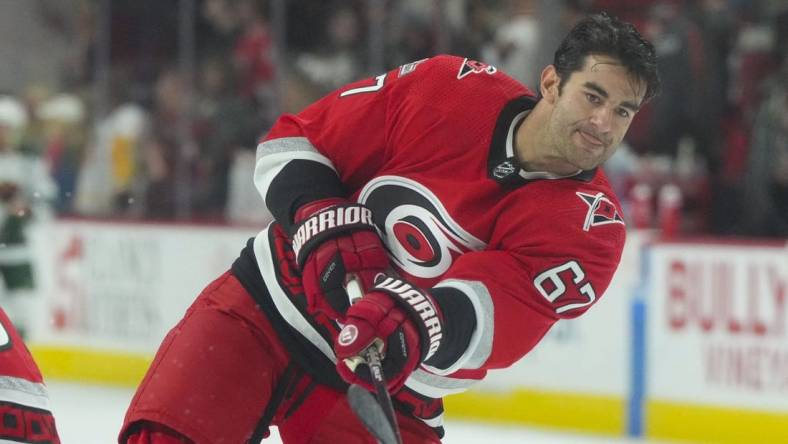 Jan 19, 2023; Raleigh, North Carolina, USA; Carolina Hurricanes left wing Max Pacioretty (67) takes a shot during warmups against the Minnesota Wild at PNC Arena. Mandatory Credit: James Guillory-USA TODAY Sports