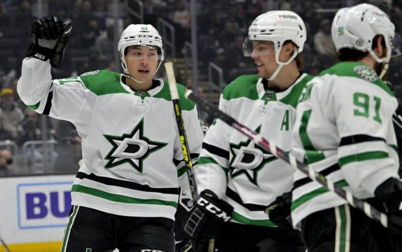 Jan 19, 2023; Los Angeles, California, USA; Dallas Stars left wing Jason Robertson (21) celebrates after a goal in the first period against the Los Angeles Kings at Crypto.com Arena. Mandatory Credit: Jayne Kamin-Oncea-USA TODAY Sports