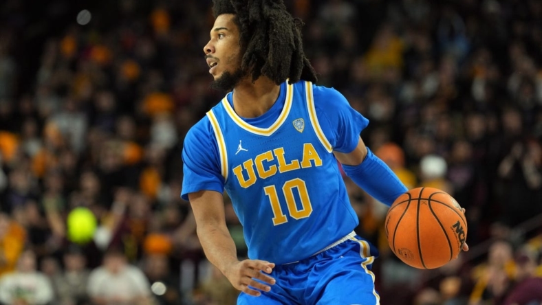 Jan 19, 2023; Tempe, Arizona, USA; UCLA Bruins guard Tyger Campbell (10) dribbles against the Arizona State Sun Devils during the first half at Desert Financial Arena. Mandatory Credit: Joe Camporeale-USA TODAY Sports