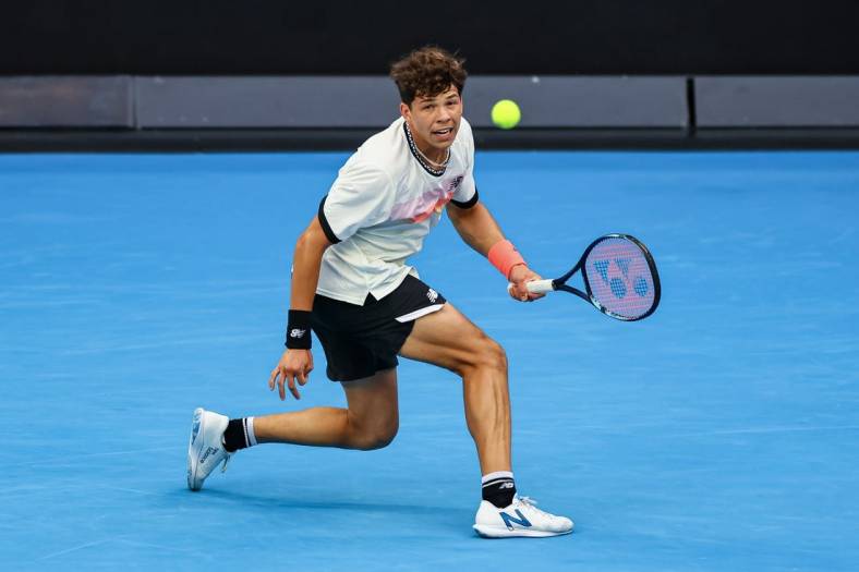 Jan 21, 2023; Melbourne, VICTORIA, Australia; Ben Shelton from the United States during his third round match against Alexi Popyrin from Australia on day six of the 2023 Australian Open tennis tournament at Melbourne Park. Mandatory Credit: Mike Frey-USA TODAY Sports