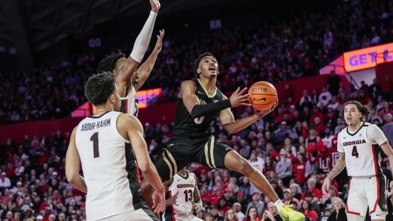 Jan 21, 2023; Athens, Georgia, USA; Vanderbilt Commodores guard Tyrin Lawrence (0) jumps towards the basket against the Georgia Bulldogs during the first half at Stegeman Coliseum. Mandatory Credit: Dale Zanine-USA TODAY Sports