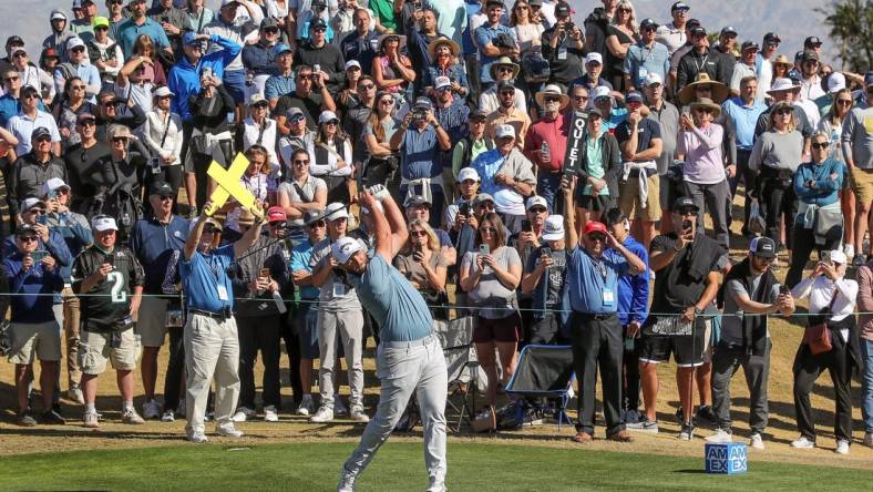 Jon Rahm tees off on the eighth hole at the Pete Dye Stadium Course at PGA West during The American Express in La Quinta, Calif., Jan. 21, 2023.

Amex Saturday 17