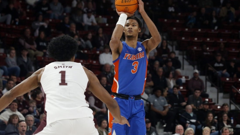 Jan 21, 2023; Starkville, Mississippi, USA; Florida Gators forward Alex Fudge (3) shoots for three during the first half  against the Mississippi State Bulldogs at Humphrey Coliseum. Mandatory Credit: Petre Thomas-USA TODAY Sports