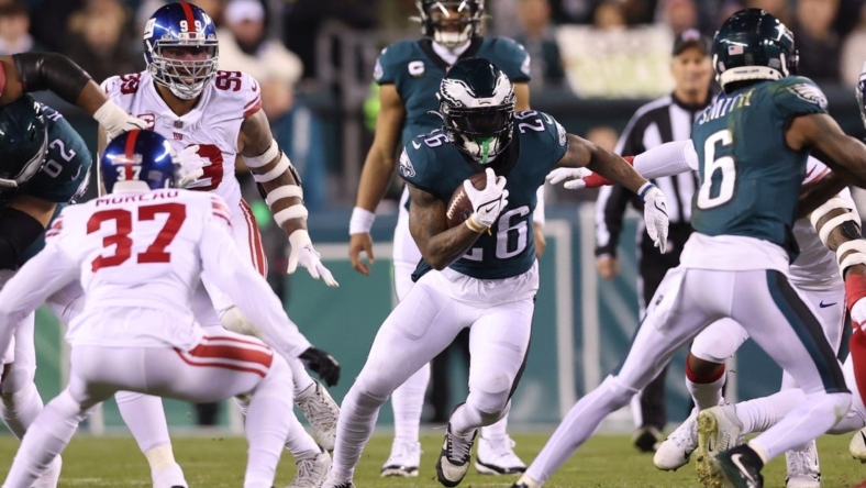 Jan 21, 2023; Philadelphia, Pennsylvania, USA; Philadelphia Eagles running back Miles Sanders (26) runs against the New York Giants in the second quarter during an NFC divisional round game at Lincoln Financial Field. Mandatory Credit: Bill Streicher-USA TODAY Sports