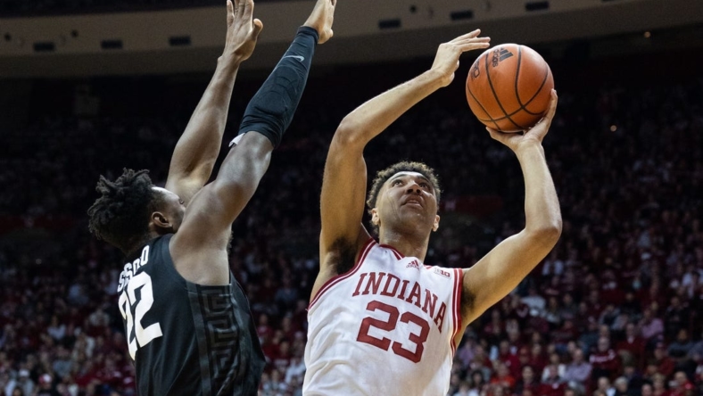 Jan 22, 2023; Bloomington, Indiana, USA; Indiana Hoosiers forward Trayce Jackson-Davis (23) shoots the ball while Michigan State Spartans center Mady Sissoko (22) defends in the first half at Simon Skjodt Assembly Hall. Mandatory Credit: Trevor Ruszkowski-USA TODAY Sports