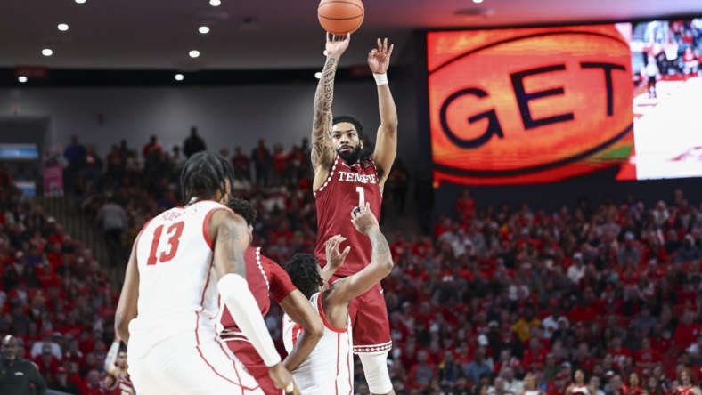 Jan 22, 2023; Houston, Texas, USA; Temple Owls guard Damian Dunn (1) shoots the ball during the first half against the Houston Cougars at Fertitta Center. Mandatory Credit: Troy Taormina-USA TODAY Sports