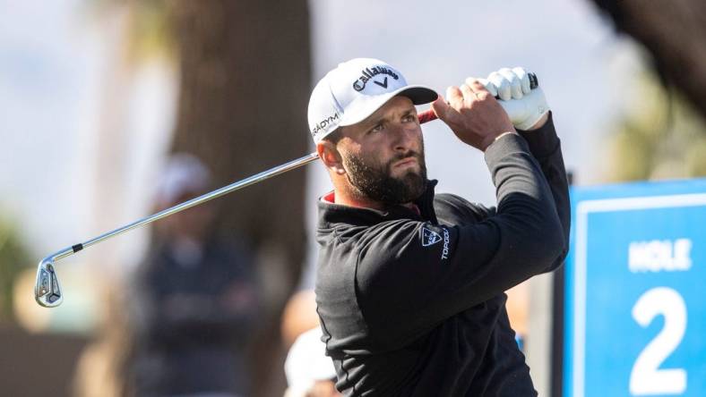 Jon Rahm hits his drive shot on hole two during the final round of The American Express on the Pete Dye Stadium Course at PGA West in La Quinta, Calif., Sunday, Jan. 22, 2023.