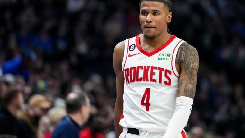 Jan 21, 2023; Minneapolis, Minnesota, USA; Houston Rockets guard Jalen Green (4) looks on during a game between the Minnesota Timberwolves and Houston Rockets at Target Center. Mandatory Credit: Brace Hemmelgarn-USA TODAY Sports