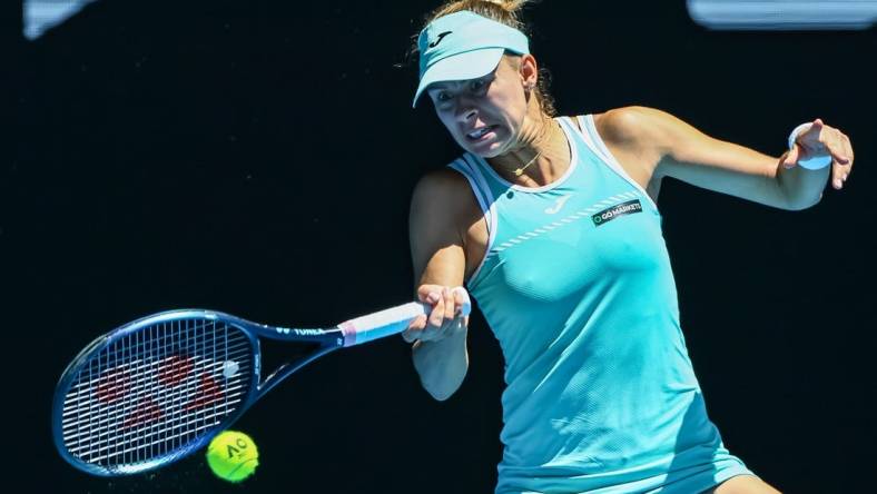 Jan 23, 2023; Melbourne, Victoria, Australia; Magda Linette from Poland during her round four match against Caroline Garcia from France on day eight of the 2023 Australian Open tennis tournament at Melbourne Park. Mandatory Credit: Mike Frey-USA TODAY Sports