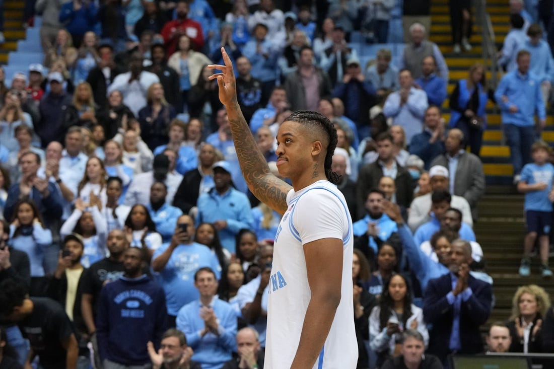 Jan 21, 2023; Chapel Hill, North Carolina, USA; North Carolina Tar Heels forward Armando Bacot (5) is recognized for becoming the all-time rebounding and double double leader after the game at Dean E. Smith Center. Mandatory Credit: Bob Donnan-USA TODAY Sports