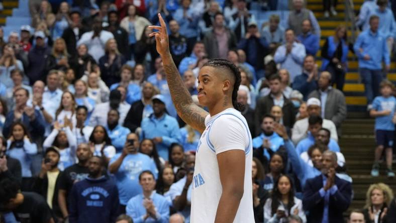 Jan 21, 2023; Chapel Hill, North Carolina, USA; North Carolina Tar Heels forward Armando Bacot (5) is recognized for becoming the all-time rebounding and double double leader after the game at Dean E. Smith Center. Mandatory Credit: Bob Donnan-USA TODAY Sports