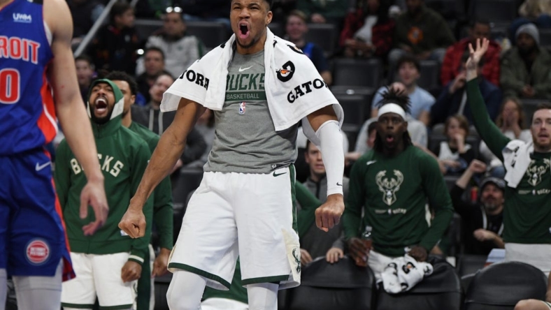 Jan 23, 2023; Detroit, Michigan, USA; Milwaukee Bucks forward Giannis Antetokounmpo's (34) reacts from the bench after his brother Thanasis (not pictured) made a basket against the Detroit Pistons in the fourth quarter at Little Caesars Arena. Mandatory Credit: Lon Horwedel-USA TODAY Sports