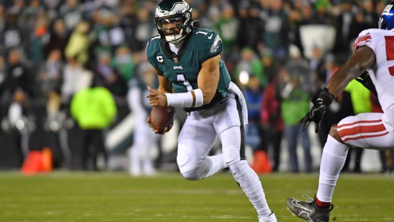 Jan 21, 2023; Philadelphia, Pennsylvania, USA; Philadelphia Eagles quarterback Jalen Hurts (1) runs against the New York Giants during an NFC divisional round game at Lincoln Financial Field. Mandatory Credit: Eric Hartline-USA TODAY Sports