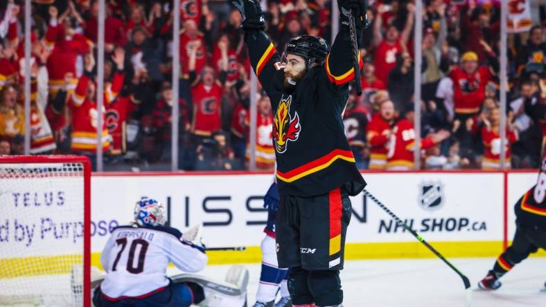 Jan 23, 2023; Calgary, Alberta, CAN; Calgary Flames center Dillon Dube (29) celebrates his goal against the Columbus Blue Jackets during the overtime period at Scotiabank Saddledome. Mandatory Credit: Sergei Belski-USA TODAY Sports
