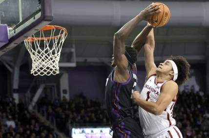 Jan 24, 2023; Fort Worth, Texas, USA;  Oklahoma Sooners forward Jalen Hill (1) defends the shot of TCU Horned Frogs forward Emanuel Miller (2) during the first half at Ed and Rae Schollmaier Arena. Mandatory Credit: Kevin Jairaj-USA TODAY Sports