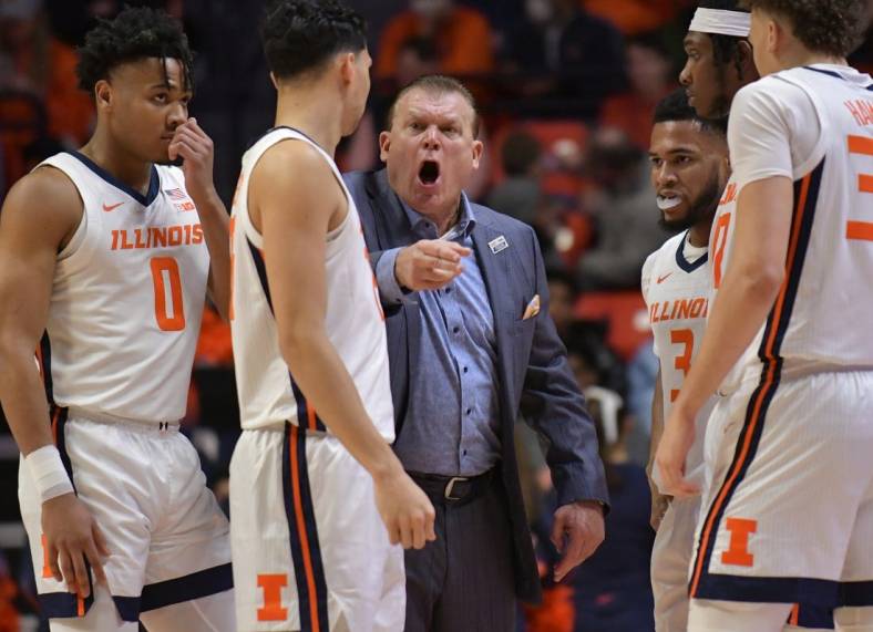 Jan 24, 2023; Champaign, Illinois, USA; Illinois Fighting Illini head coach Brad Underwood directs his players during the first half against the Ohio State Buckeyes at State Farm Center. Mandatory Credit: Ron Johnson-USA TODAY Sports