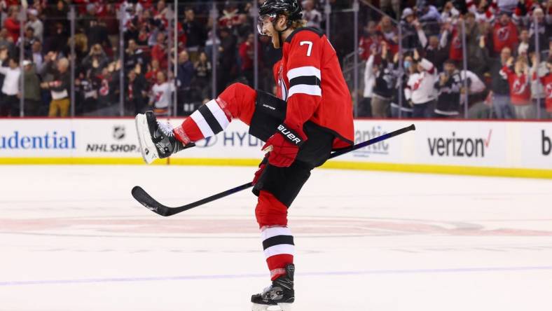 Jan 24, 2023; Newark, New Jersey, USA; New Jersey Devils defenseman Dougie Hamilton (7) celebrates his game winning goal against the Vegas Golden Knights during overtime at Prudential Center. Mandatory Credit: Ed Mulholland-USA TODAY Sports