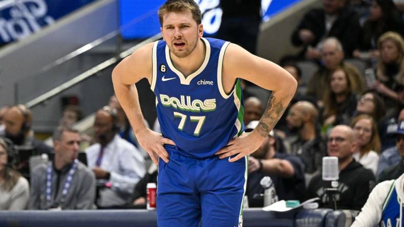 Jan 24, 2023; Dallas, Texas, USA; Dallas Mavericks guard Luka Doncic (77) reacts to receiving a technical foul during the second half against the Washington Wizards at the American Airlines Center. Mandatory Credit: Jerome Miron-USA TODAY Sports