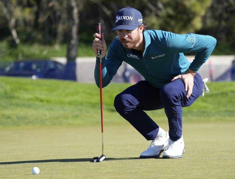 Jan 25, 2023; San Diego, California, USA; Sam Ryder  lines up a putt on the 8th hole during the first round of the Farmers Insurance Open golf tournament at Torrey Pines Municipal Golf Course - North Course. Mandatory Credit: Ray Acevedo-USA TODAY Sports