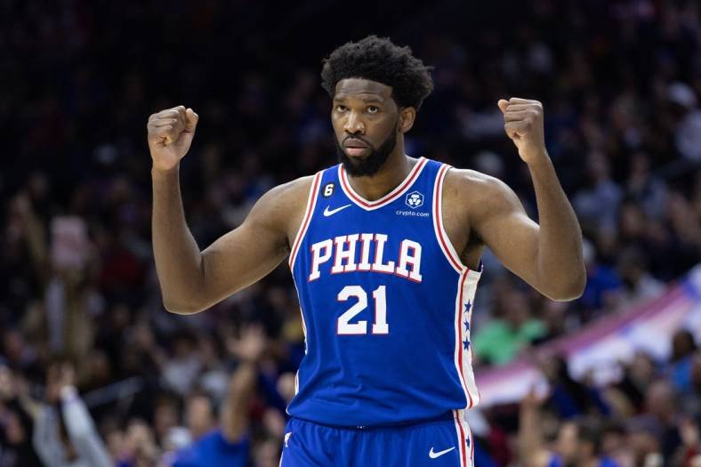 Jan 25, 2023; Philadelphia, Pennsylvania, USA; Philadelphia 76ers center Joel Embiid (21) reacts after a score against the Brooklyn Nets during the second quarter at Wells Fargo Center. Mandatory Credit: Bill Streicher-USA TODAY Sports