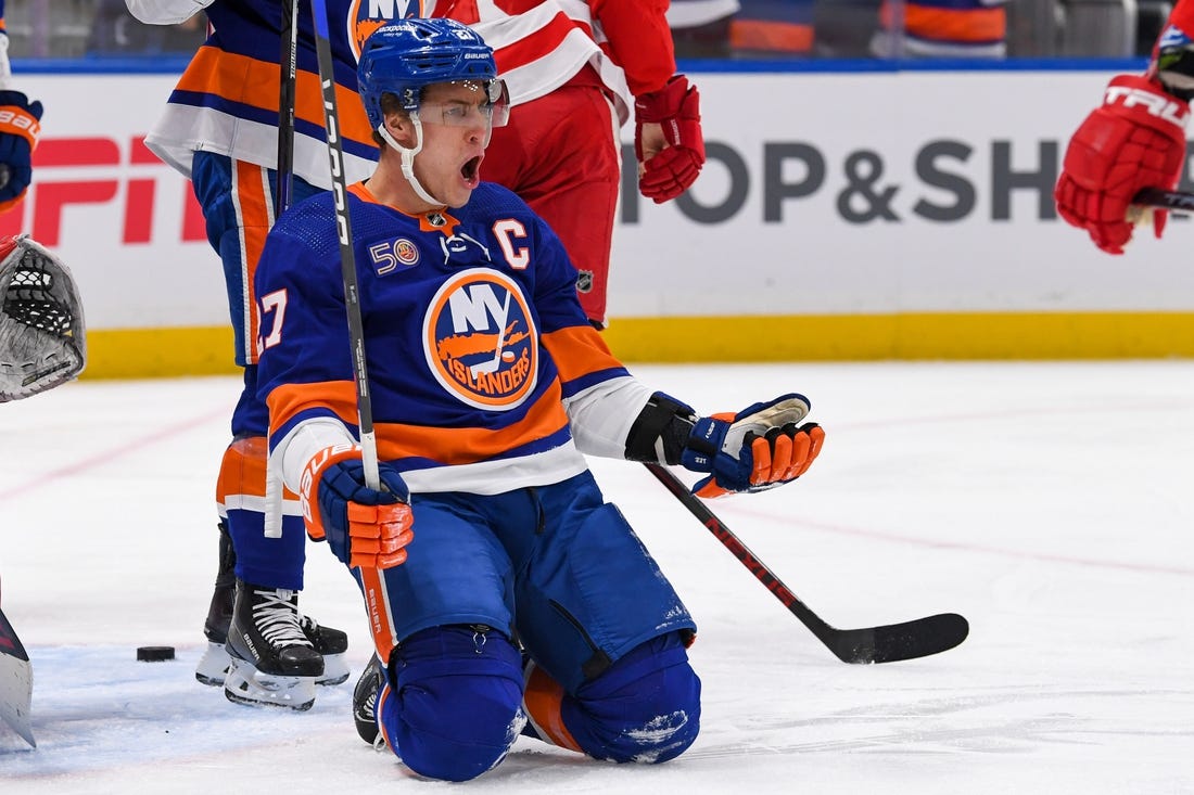 Jan 27, 2023; Elmont, New York, USA; New York Islanders left wing Anders Lee (27) celebrates his goal against the Detroit Red Wings during the second period at UBS Arena. Mandatory Credit: Dennis Schneidler-USA TODAY Sports