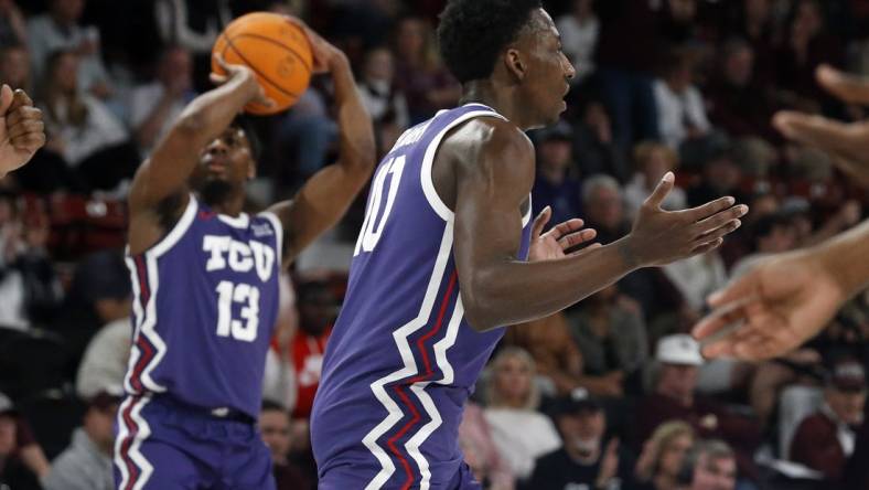 Jan 28, 2023; Starkville, Mississippi, USA; TCU Horned Frogs guard Damion Baugh (10) reacts to a charging foul during the first half  against the Mississippi State Bulldogs at Humphrey Coliseum. Mandatory Credit: Petre Thomas-USA TODAY Sports