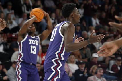 Jan 28, 2023; Starkville, Mississippi, USA; TCU Horned Frogs guard Damion Baugh (10) reacts to a charging foul during the first half  against the Mississippi State Bulldogs at Humphrey Coliseum. Mandatory Credit: Petre Thomas-USA TODAY Sports