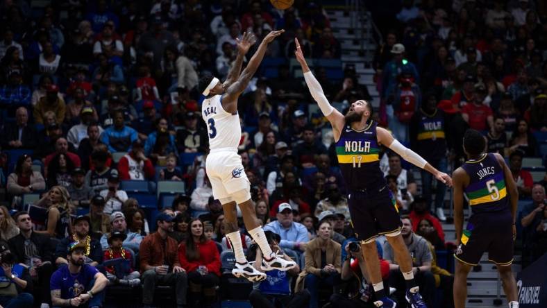 Jan 28, 2023; New Orleans, Louisiana, USA;  Washington Wizards guard Bradley Beal (3) shoots a jump shot over New Orleans Pelicans center Jonas Valanciunas (17) during the first half at Smoothie King Center. Mandatory Credit: Stephen Lew-USA TODAY Sports