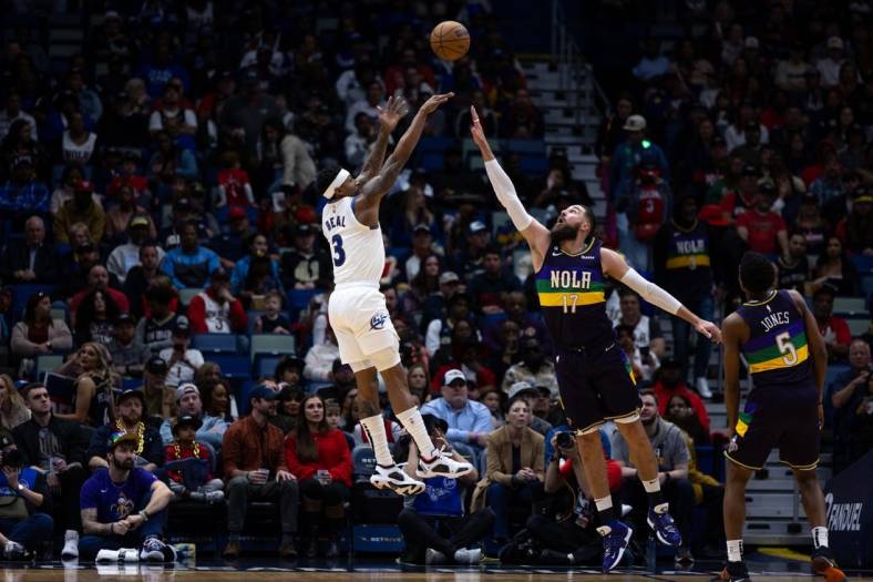 Jan 28, 2023; New Orleans, Louisiana, USA;  Washington Wizards guard Bradley Beal (3) shoots a jump shot over New Orleans Pelicans center Jonas Valanciunas (17) during the first half at Smoothie King Center. Mandatory Credit: Stephen Lew-USA TODAY Sports