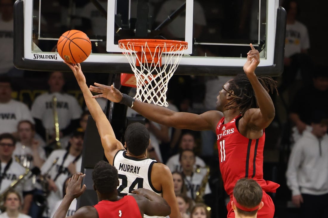 Jan 29, 2023; Iowa City, Iowa, USA; Rutgers Scarlet Knights center Clifford Omoruyi (11) defends the shot from Iowa Hawkeyes forward Kris Murray (24) during the first half at Carver-Hawkeye Arena. Mandatory Credit: Reese Strickland-USA TODAY Sports