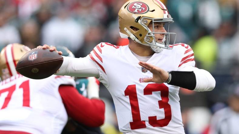 Jan 29, 2023; Philadelphia, Pennsylvania, USA; San Francisco 49ers quarterback Brock Purdy (13) throws a pass against the Philadelphia Eagles during the first quarter in the NFC Championship game at Lincoln Financial Field. Mandatory Credit: Bill Streicher-USA TODAY Sports