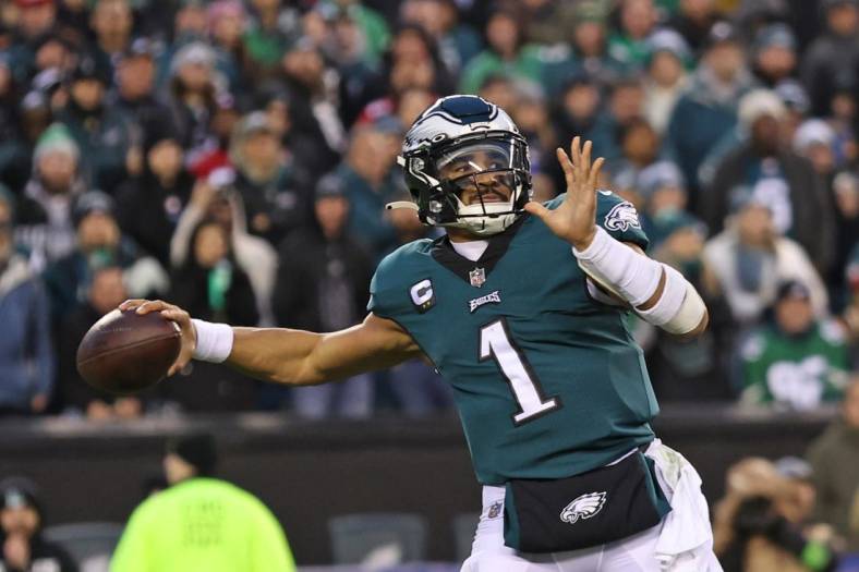 Jan 29, 2023; Philadelphia, Pennsylvania, USA; Philadelphia Eagles quarterback Jalen Hurts (1) throws a pass against the San Francisco 49ers during the third quarter in the NFC Championship game at Lincoln Financial Field. Mandatory Credit: Bill Streicher-USA TODAY Sports