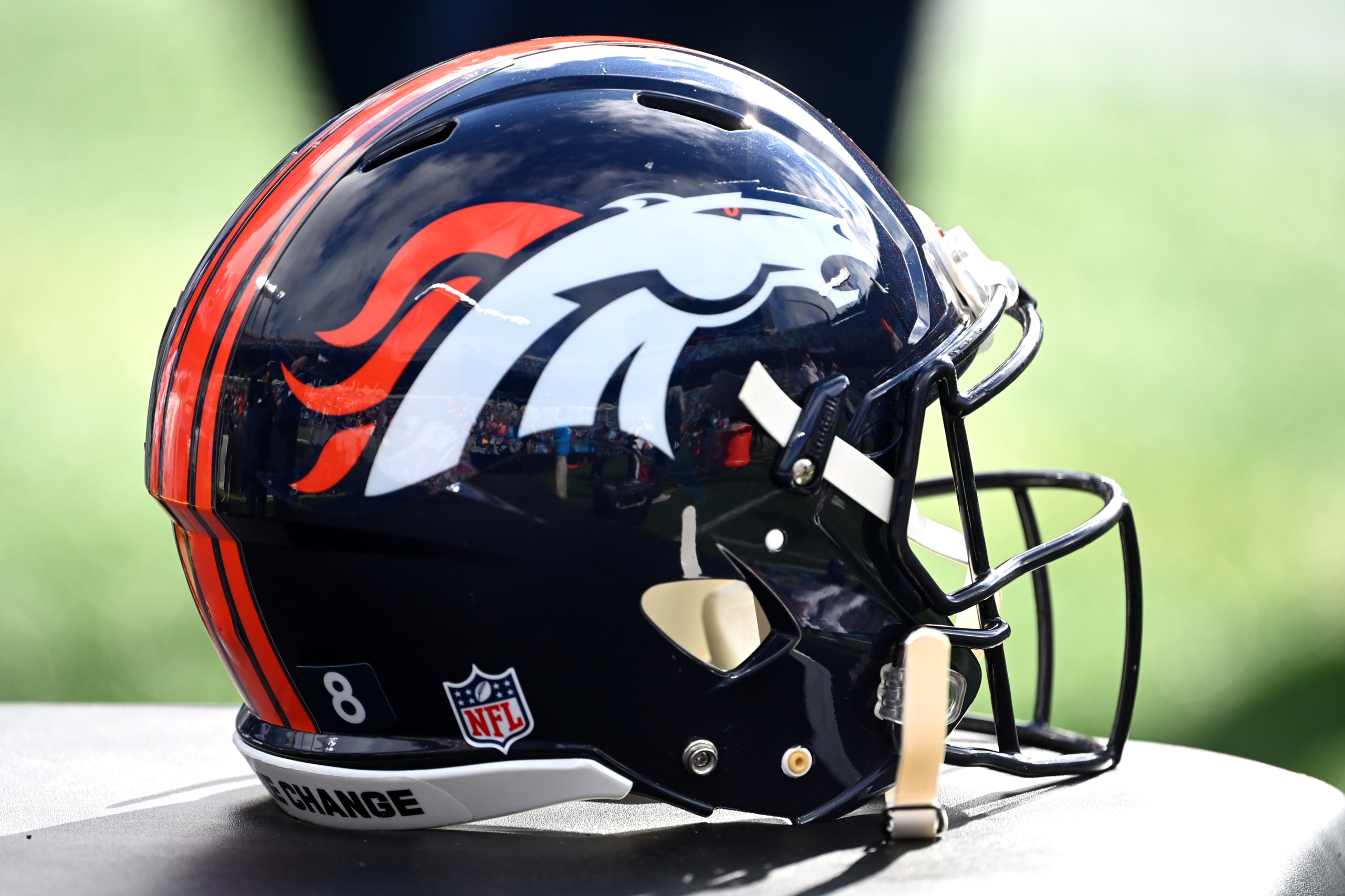 The Denver Broncos alternate helmet is displayed for fans during NFL  Welcome Back festivities at the Broncos' NFL football training camp  Saturday, July 29, 2023, in Centennial, Colo. (AP Photo/David Zalubowski  Stock