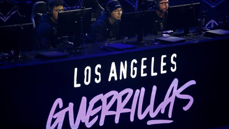 Jan 25, 2020; Minneapolis, Minnesota, USA; Andres Lacefield and Ulysses Aqua Silva and Renato Saints Forza of the Los Angeles Guerrillas play against the Florida Mutineers during the Call of Duty League Launch Weekend at The Armory. Mandatory Credit: Bruce Kluckhohn-USA TODAY Sports