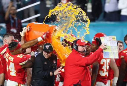 Feb 2, 2020; Miami Gardens, Florida, USA; Kansas City Chiefs head coach Andy Reid is dunked with Gatorade by his players in the fourth quarter against the San Francisco 49ers in Super Bowl LIV at Hard Rock Stadium. Mandatory Credit: Mark J. Rebilas-USA TODAY Sports