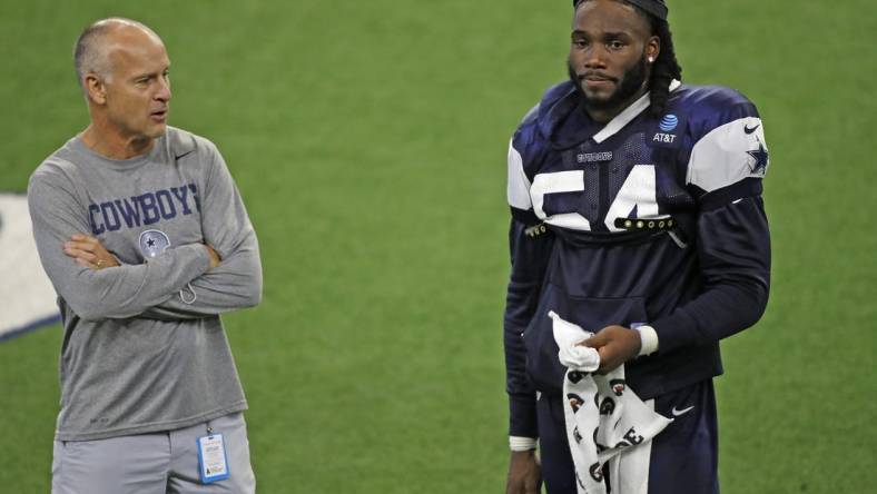 Aug 24, 2020; Frisco, TX, USA;  Dallas Cowboys player Jaylon Smith (right) talks with Mike Nolan during training camp at Ford Center at The Star in Frisco, Texas.   Mandatory Credit: James D. Smith via USA TODAY Sports